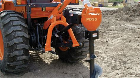 skid steer post hole digger attachment|kubota post hole digger attachment.